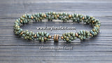 Matte khaki green beaded bracelet with a magnet clasp on a wooden surface, featuring the website www.mybeadkit.com.