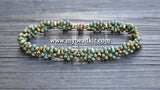 Matte Khaki Berry bead bracelet - front facing on a wooden surface with www.mybeadkit.com listed.